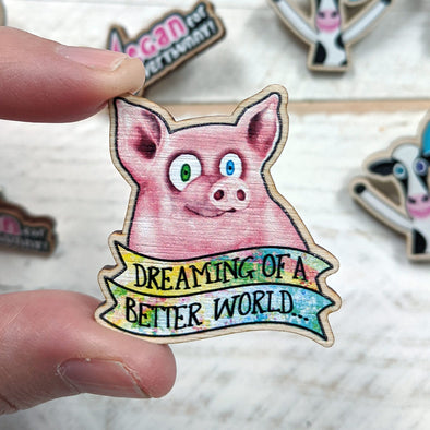 "Dreaming of a Better World" Wood Pig Pins Now Available